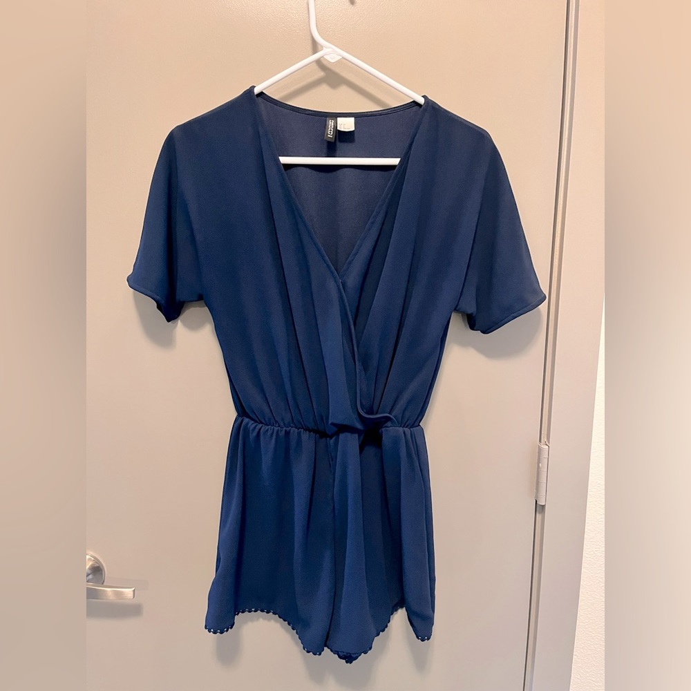 Navy blue jumpsuit/romper, shorts and short sleeves, size 6